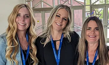 Dental team members networking at an event